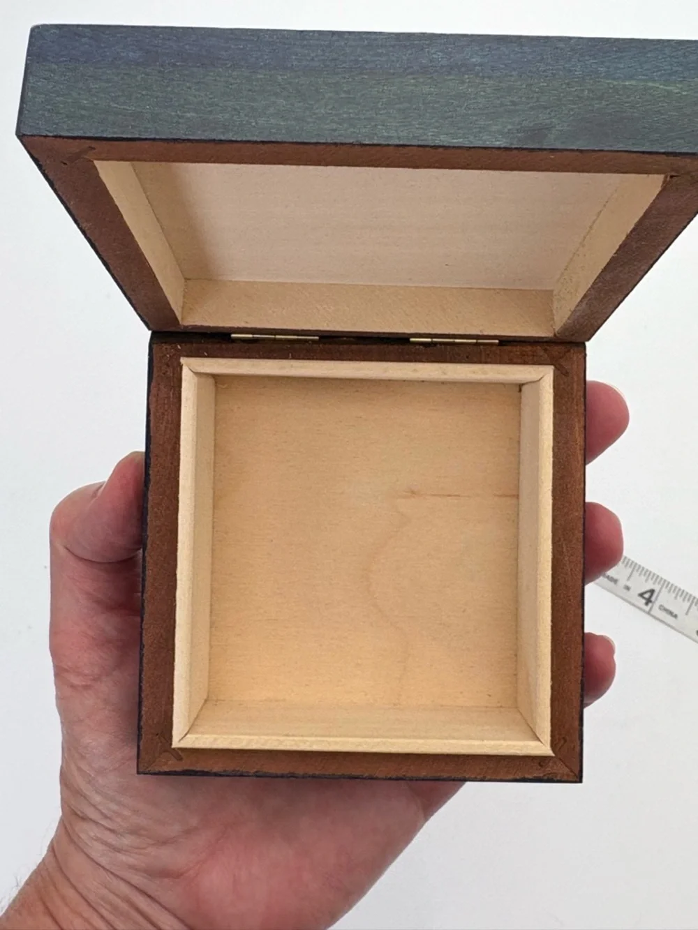 Bright Yellow Sun on Deep Blue Wooden Box